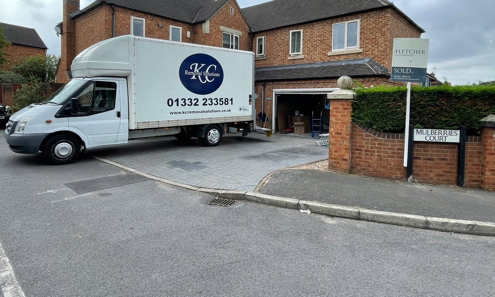 KC Removal Solutions lorry at a large sold Derby home