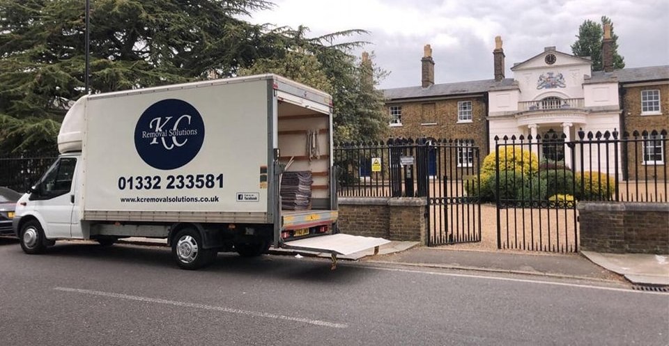 KC Removal Solutions van outside a sold Derby property